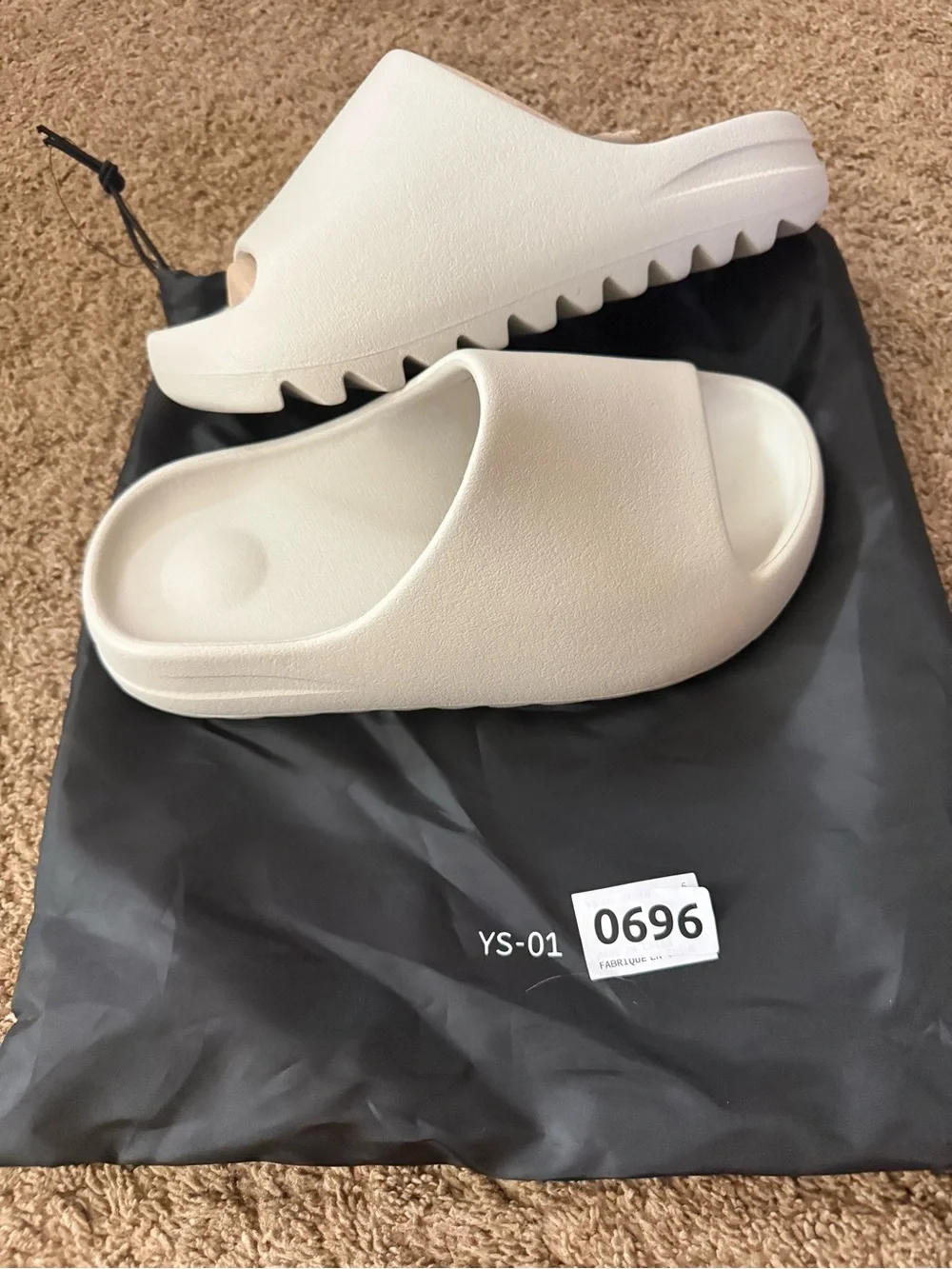 Yeezy Slide Sandals in Bone/Light Grey